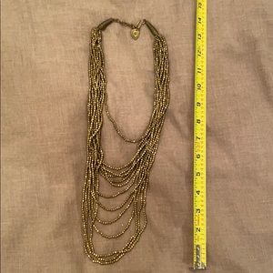 Gold beaded multi strand necklace